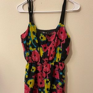 Size: Large. Color: Black with blue, yellow, and pink flowers.